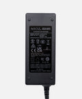 NEOZ 65W power supply for N1 Charging Tray – compact switch-mode adapter with 24V 2.7A output for six cordless lamps.