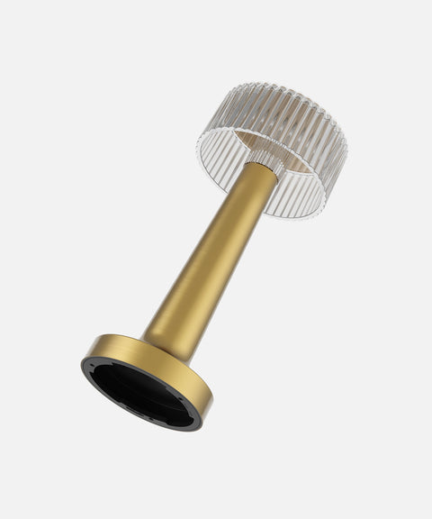 NEOZ Cooee 4 cordless lamp body in Lacquered Brass finish with ribbed clear diffuser.