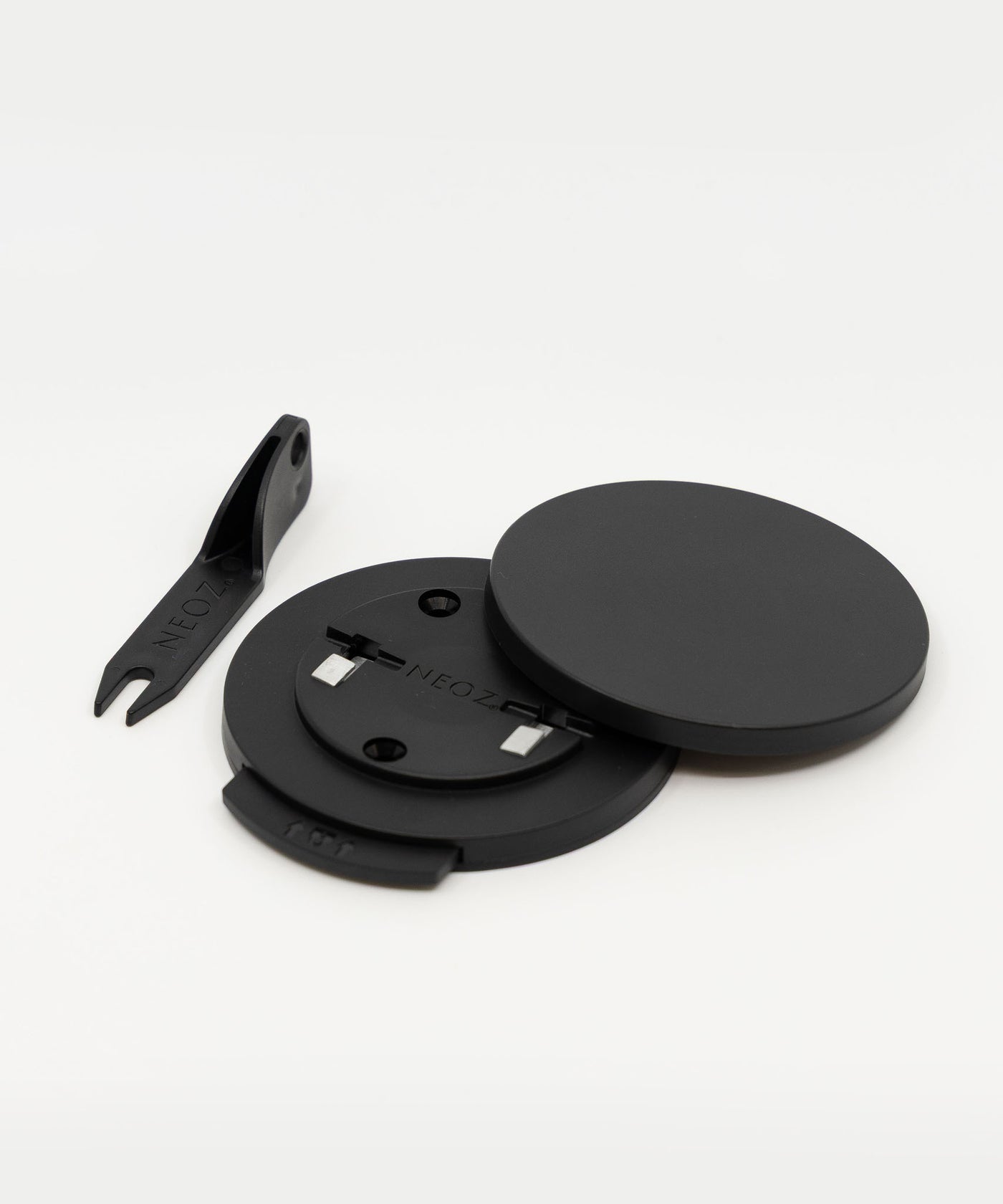 NEOZ N1 Cordless Lamp Lock components: base plate, locking mechanism and release key in matte black
